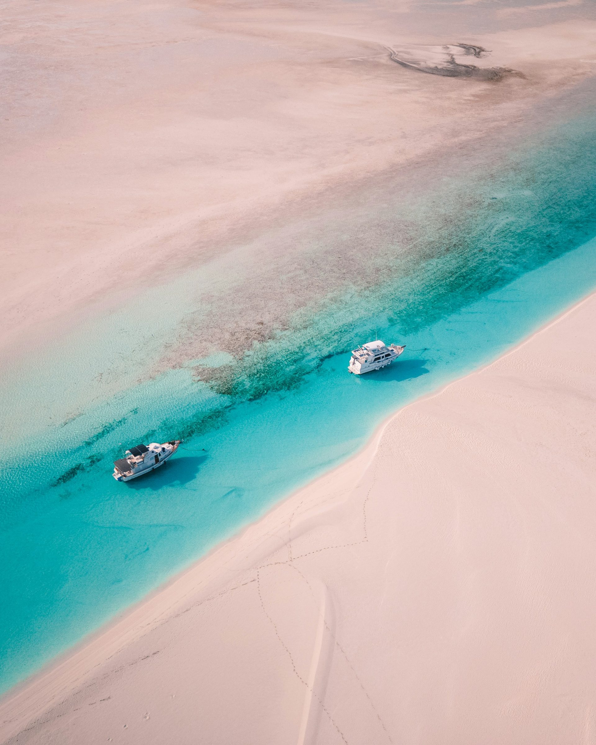 Yachts moored on a sandbar from the air, Turks and Caicos, Caribbean