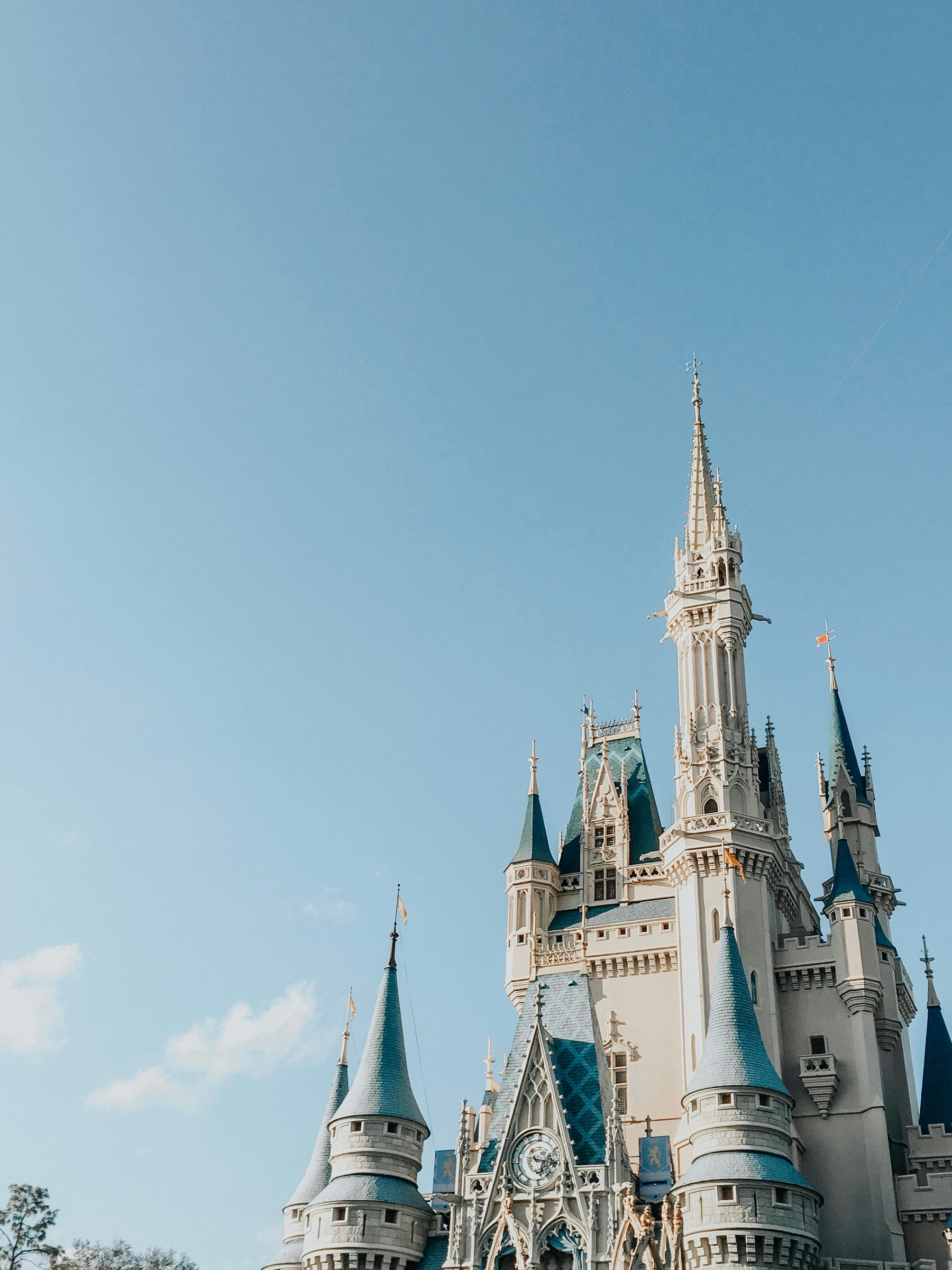 Cinderella Castle against a clear blue sky at Magic Kingdom, Walt Disney World, Orlando