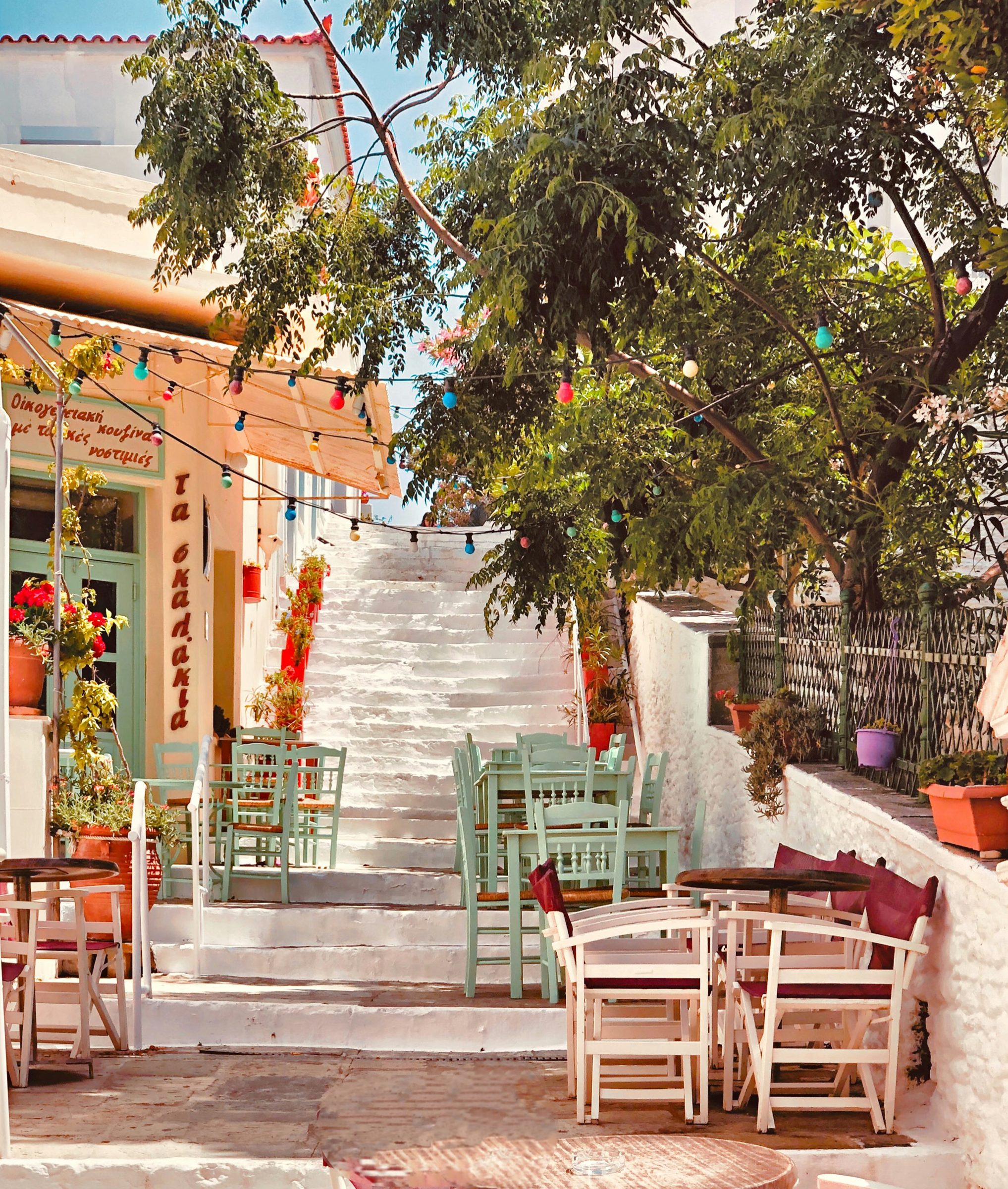 A taverna on whitewashed steps, the Cyclades, Greece