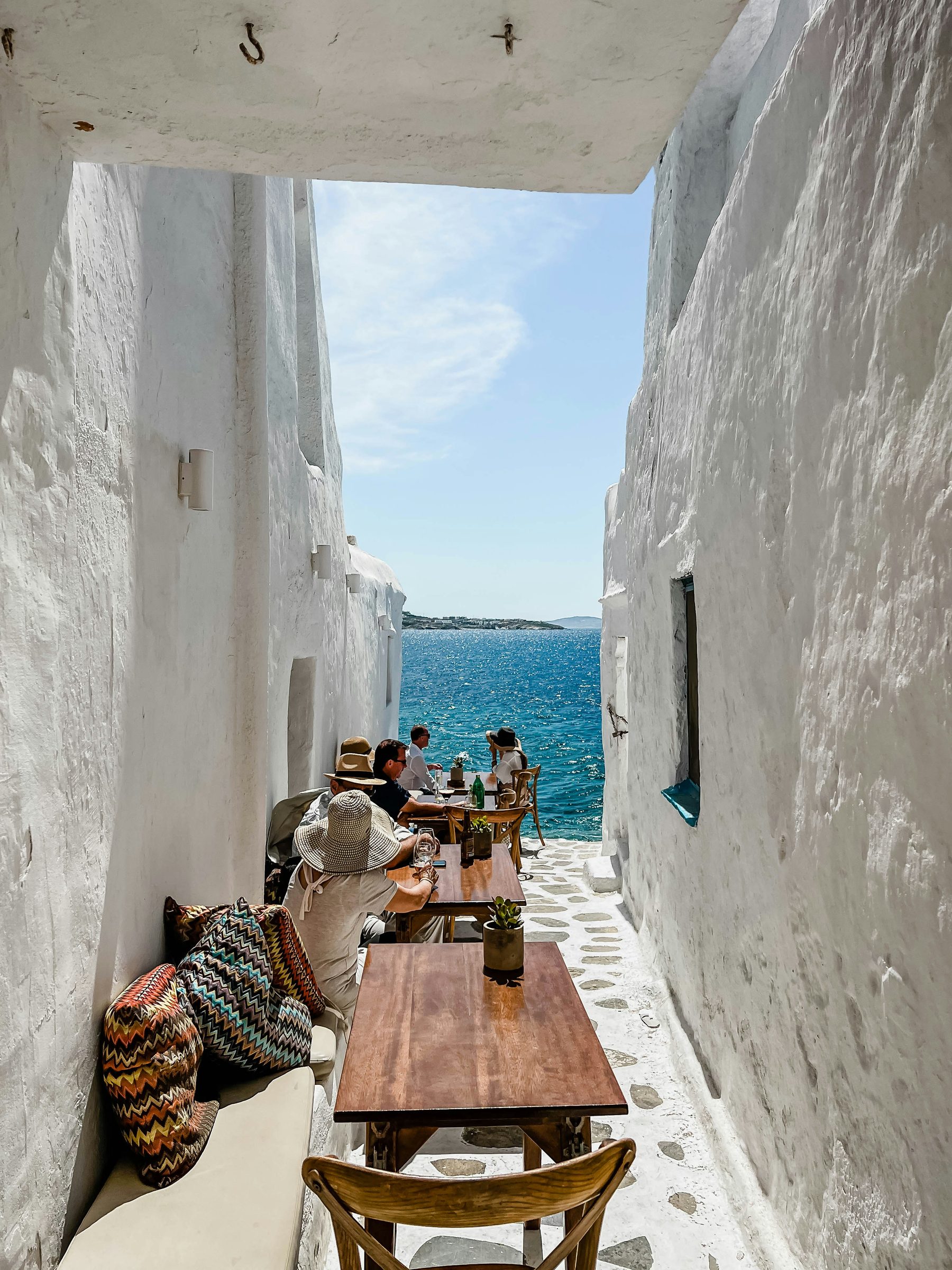 A whitewashed lane and the sea, Mykonos, Greece