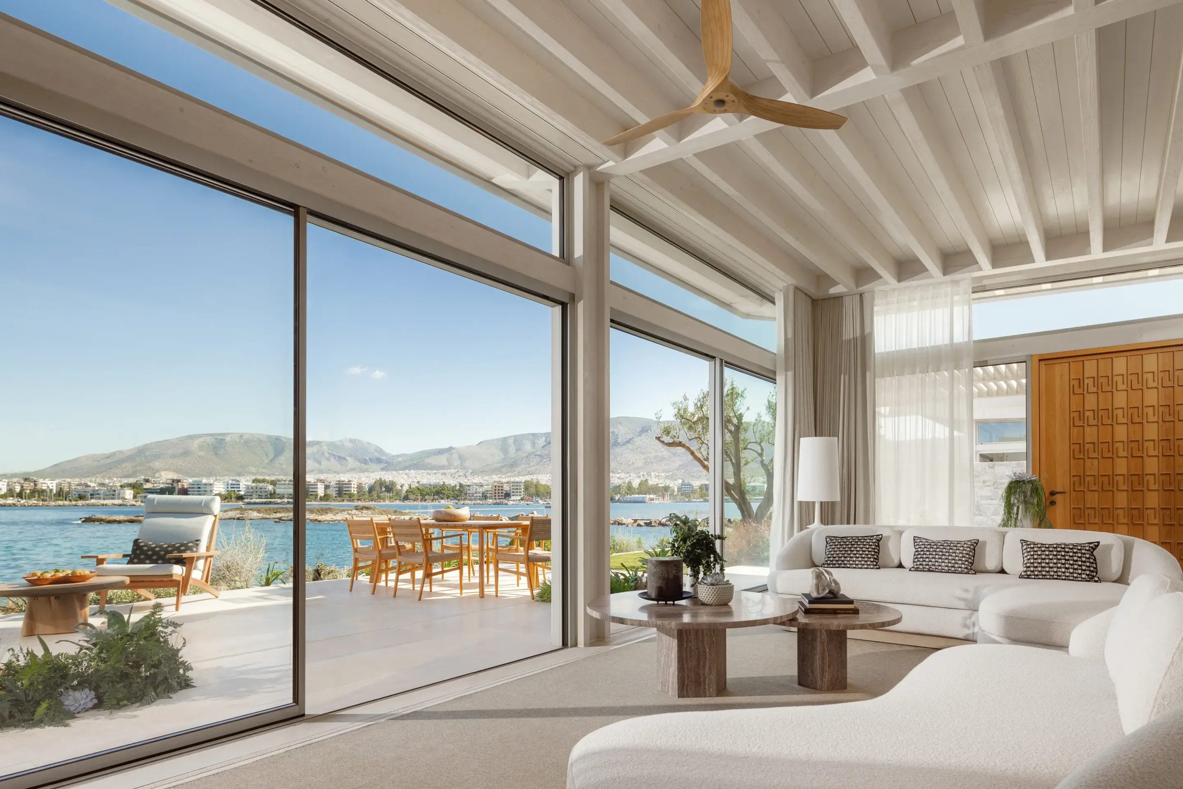 A bright suite opening onto the sea, One&Only Aesthesis