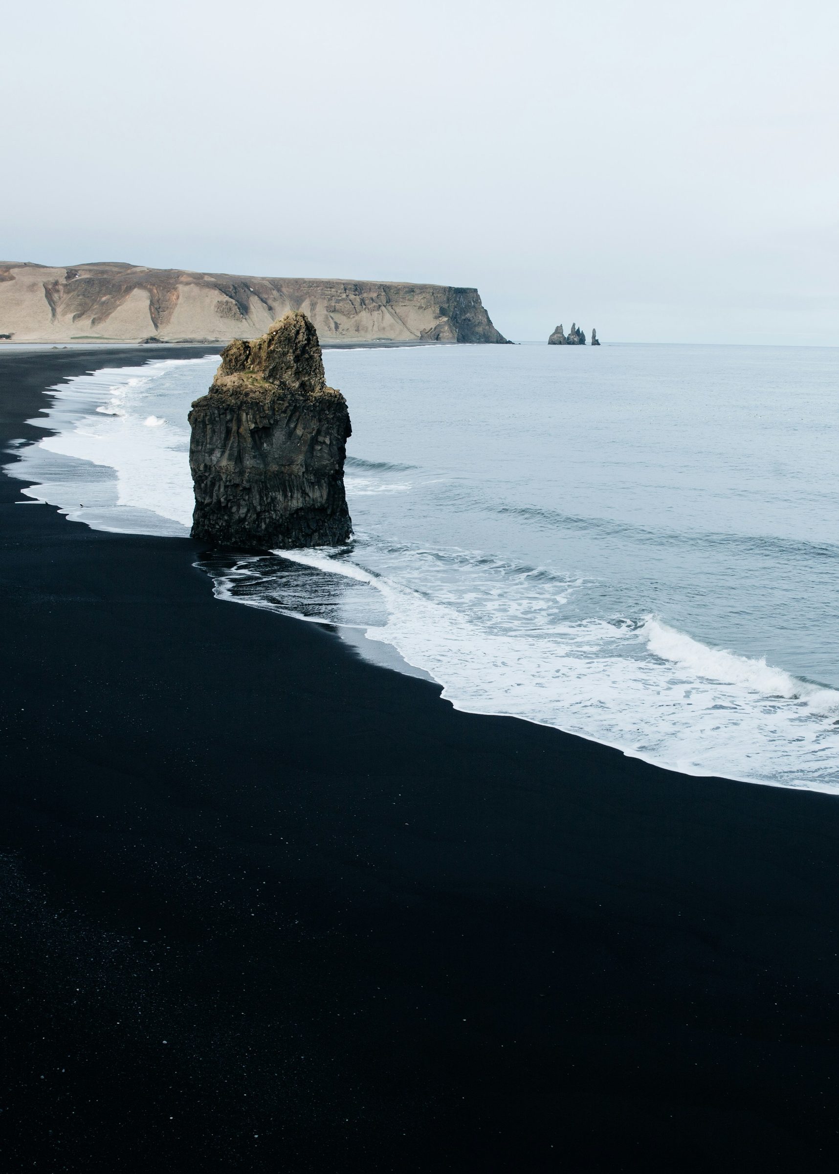 A black-sand beach and sea stack, the South Coast, Iceland