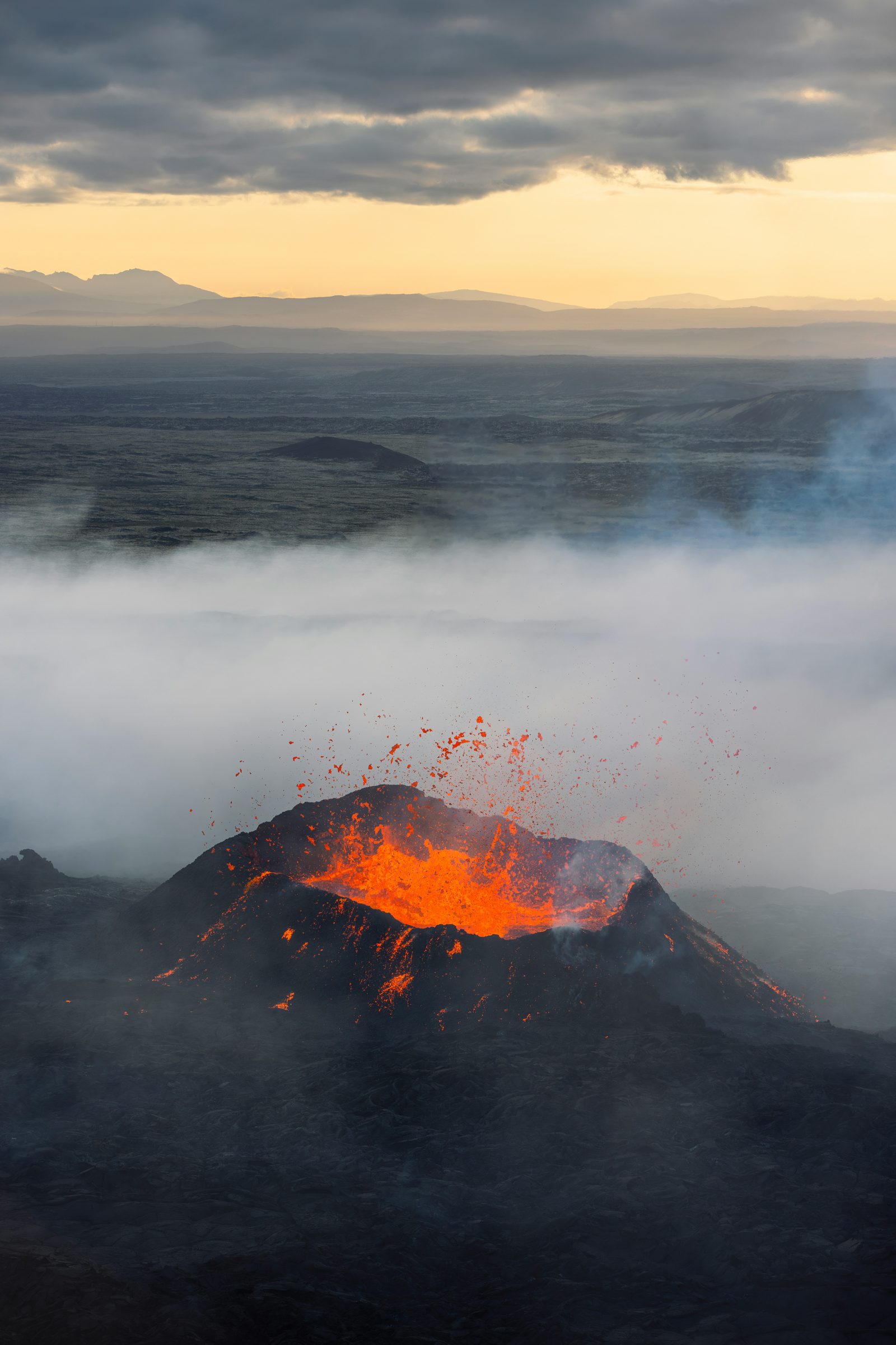 A helicopter flight over an erupting volcano, Iceland