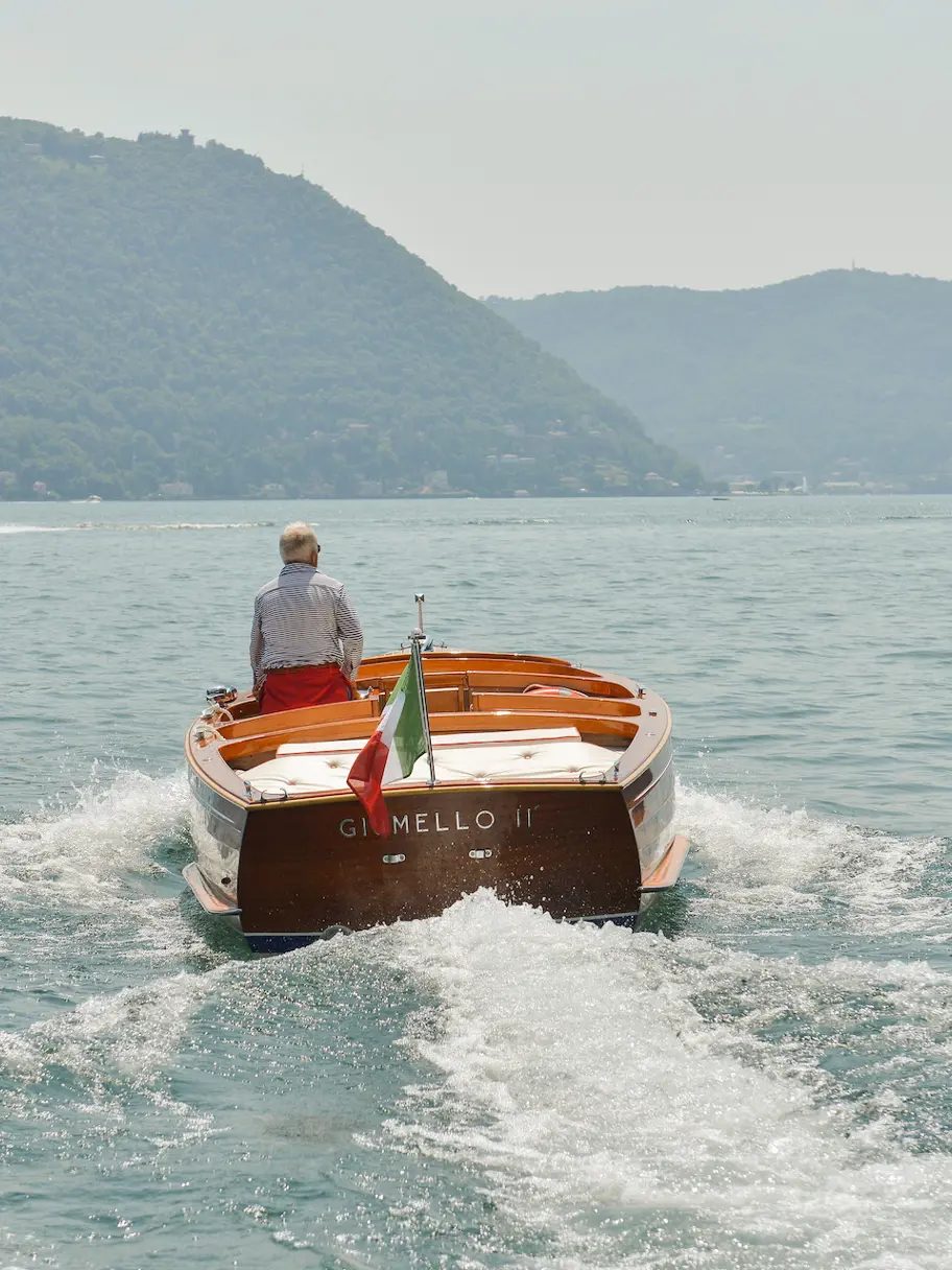 A classic wooden boat on Lake Como