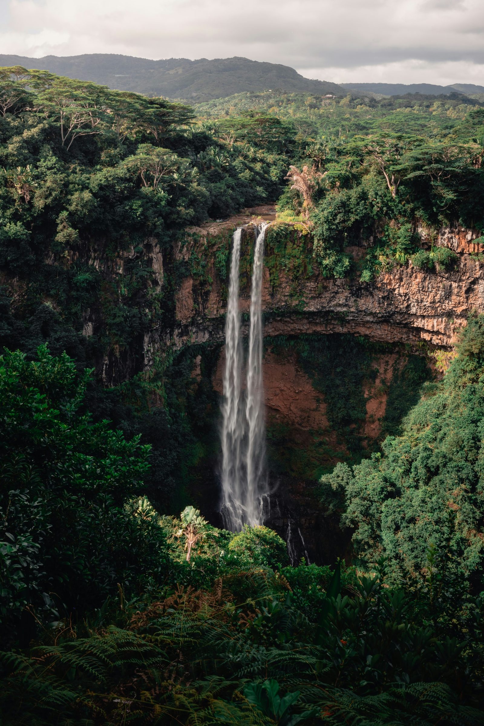 The Chamarel waterfall falling through forest, the south-west of Mauritius