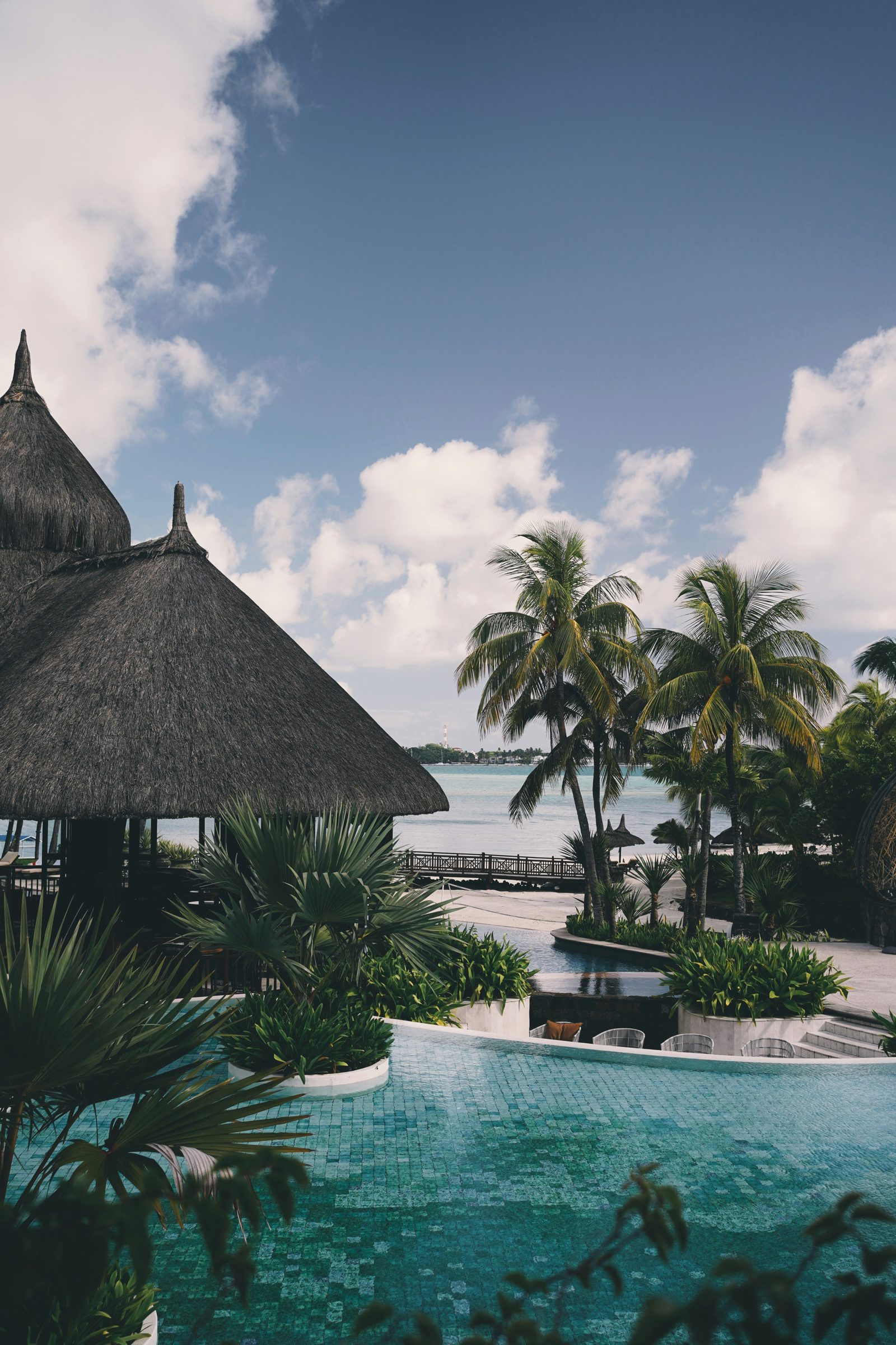 A thatched pavilion and pool above the sea, the east coast, Mauritius