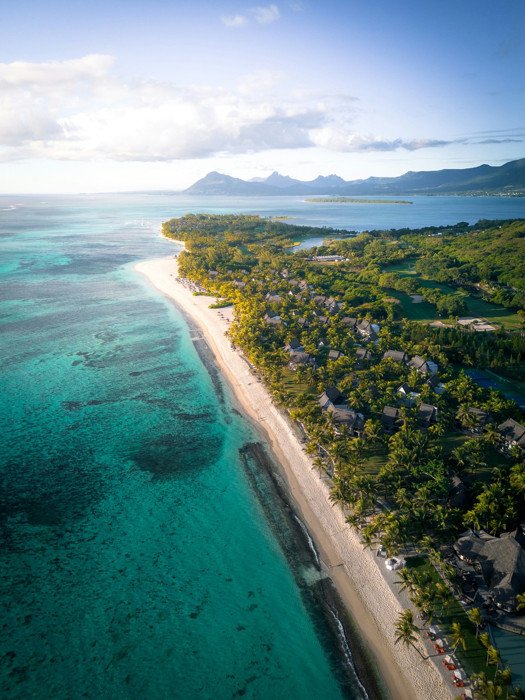 A long beach and turquoise lagoon along the Mauritius coast