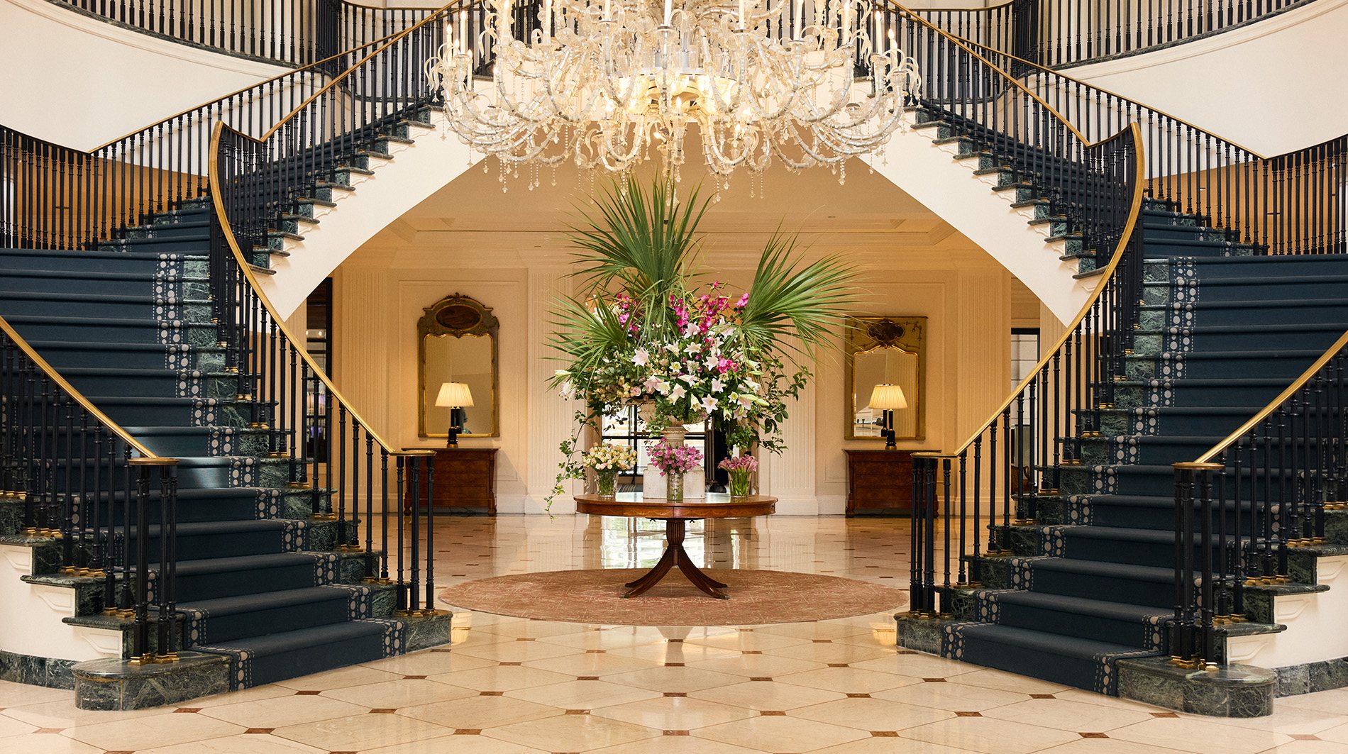 A comfortable, classically decorated guest room at The Charleston Place