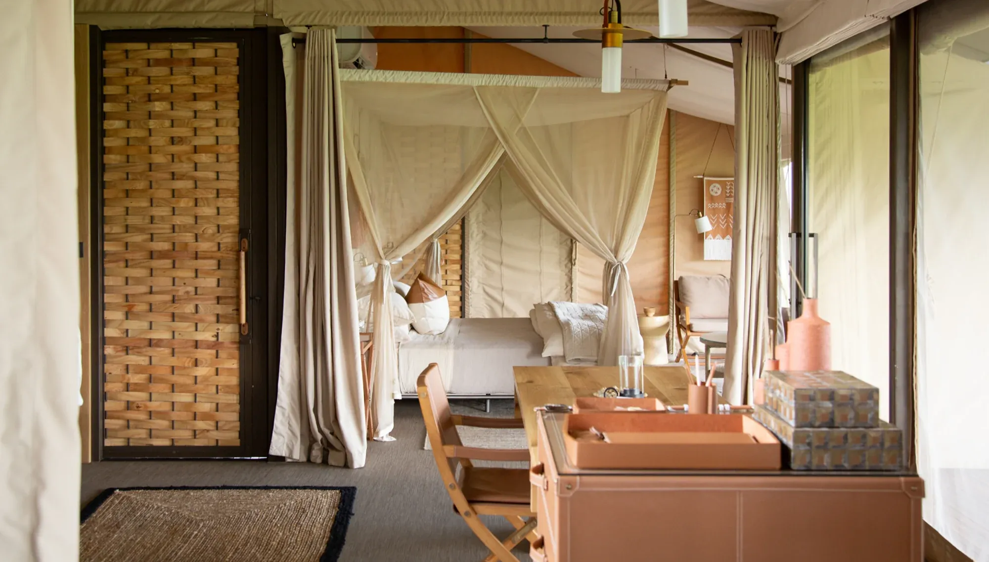 A considered hotel interior with warm light and quiet detail